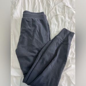 Small loose dark grey under armour sweatpants